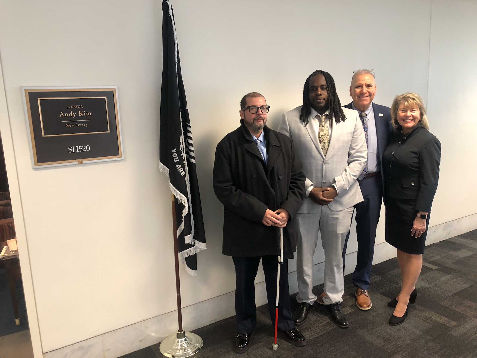 Bestwork Advocates outside of New Jersey legislators office on Capitol Hill. Pictured left-right: Wilfredo Martinez, Alfonso Harrell, Jon Katz, and Julie Fenton.